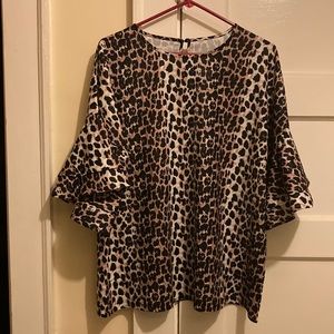 Leopard print blouse with 3/4 bell sleeves and keyhole back details